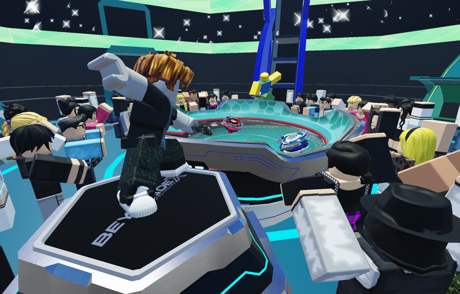 BEYBLADE X-BATTLES。プレイヤーがスタジアムを囲む承認済み画像。